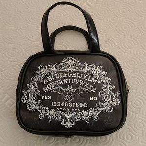 Faux leather ouija board handbag